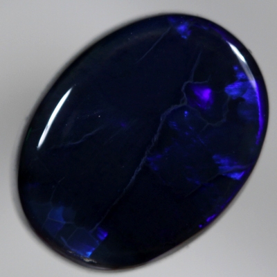 SOLID BLACK OPAL Electric royal blue moves in rolling flashes